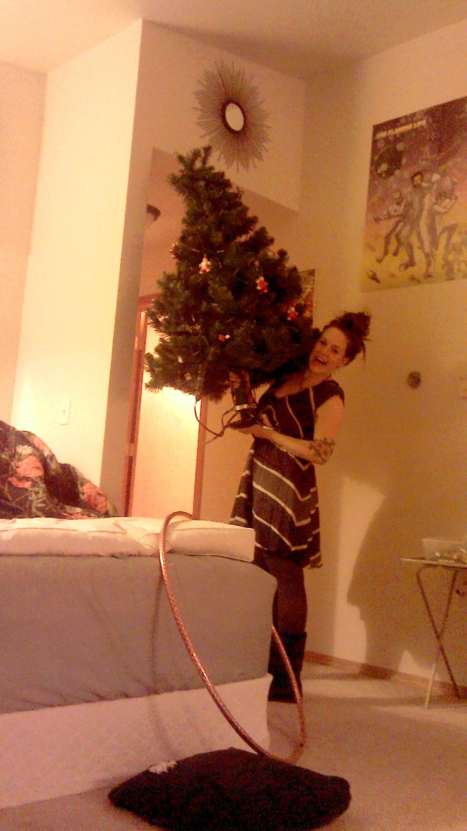 Andrea putting away the Christmas tree Betsy Bun Bun wanted so desperately to eat. 